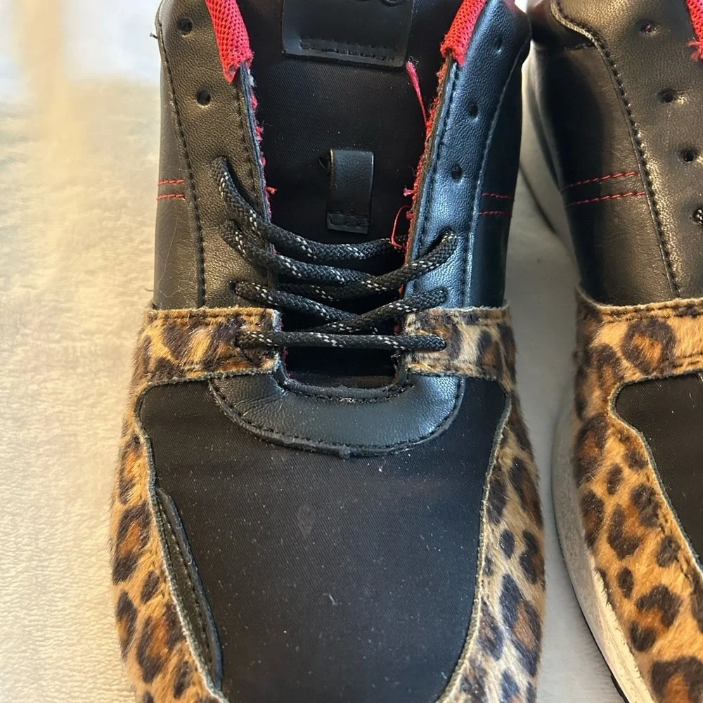 Aldo black and brown cheetah print lace up sneakers size 10 red accents